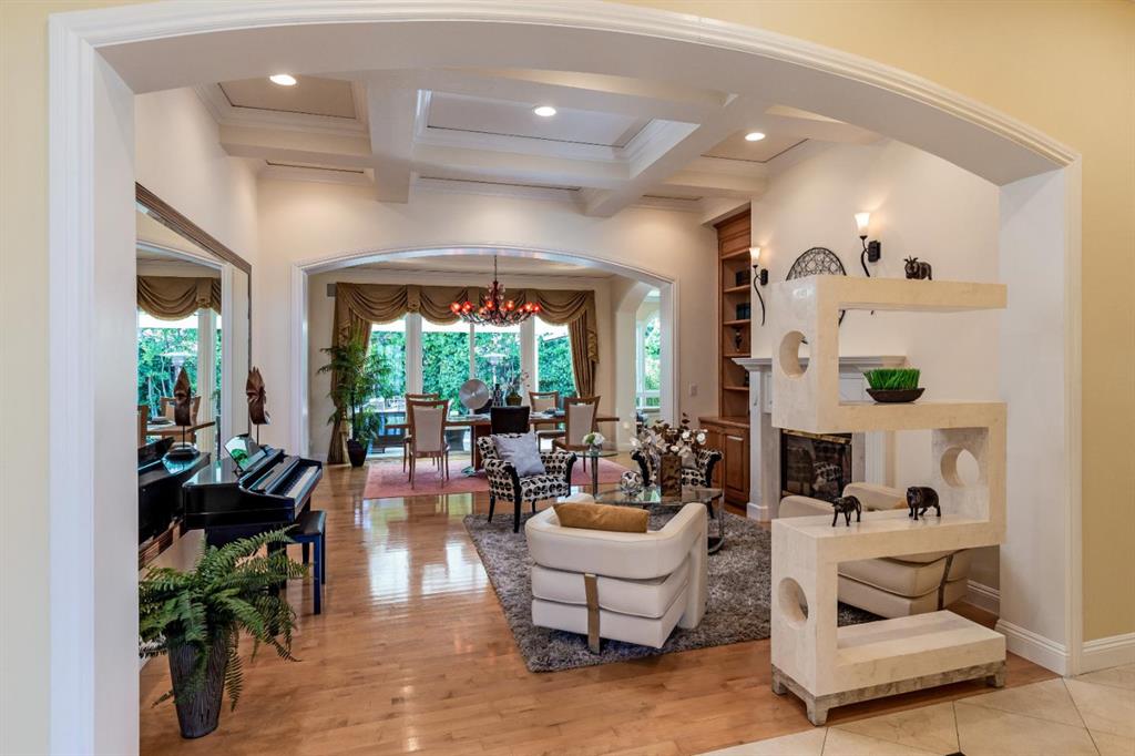 A living room filled with furniture and a fireplace.