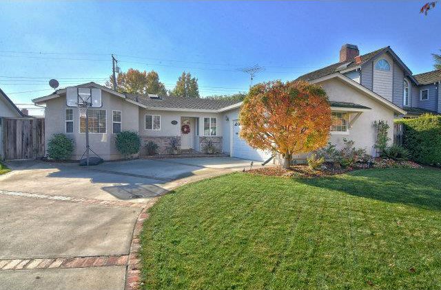 A house with a tree in the yard